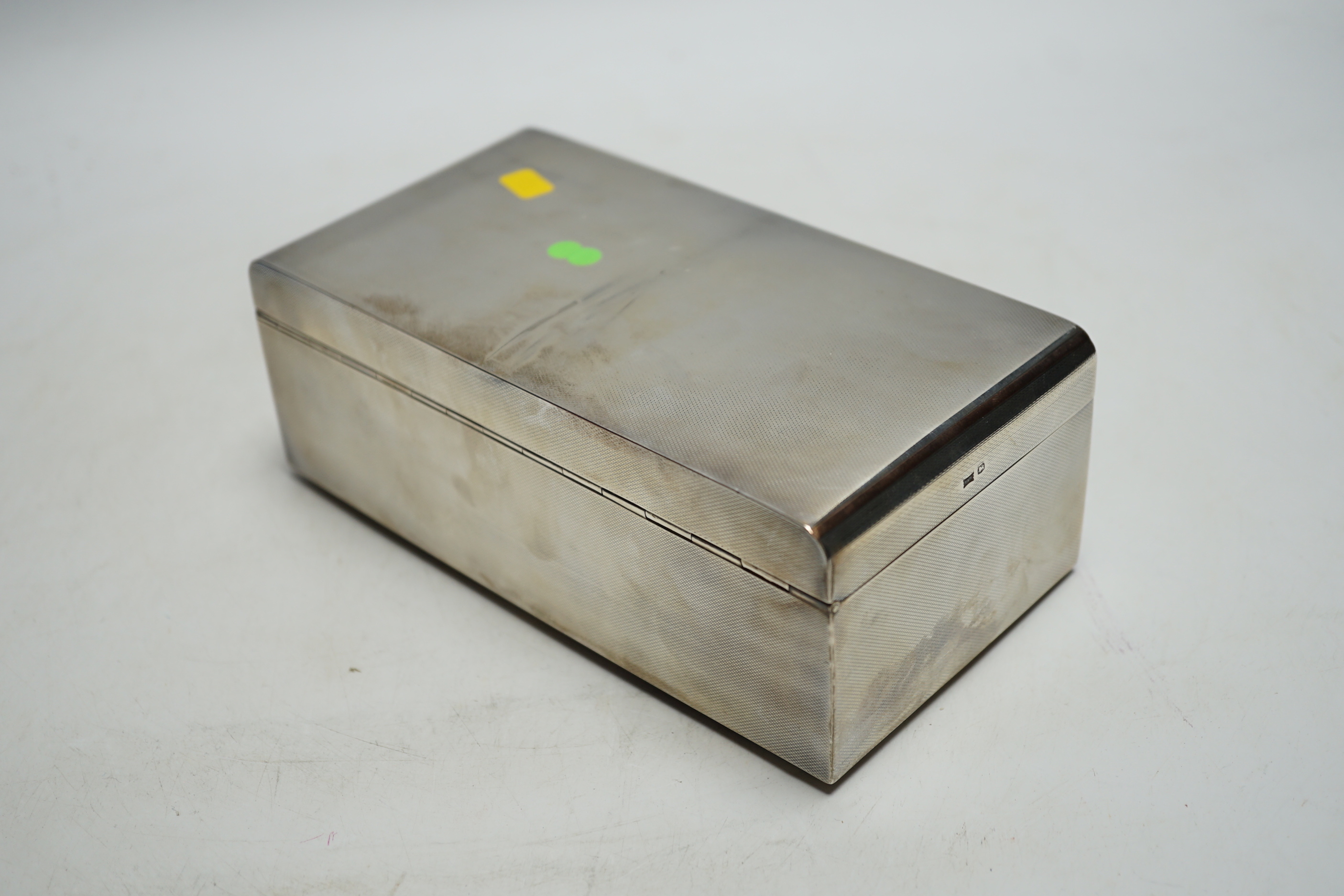 A George VI silver mounted cigarette box, Walker & Hall, Sheffield, 1946, 18cm.
